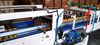 High-Speed 5-Station Packaging for Glass Fruit Jars with Servo-Buffered Drop & Hot Melt Glue