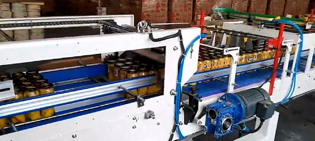 High-Speed 5-Station Packaging for Glass Fruit Jars with Servo-Buffered Drop & Hot Melt Glue